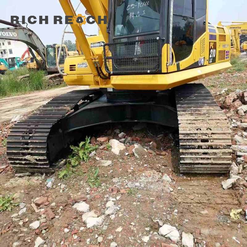 Hydraulic main pump and control valves of a 2018 Komatsu PC210 excavator priced at $30,556